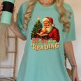 He Sees What You’Ve Been Reading Santa Book Lover Christmas Women's Comfort Colors T-Shirt Violet He Sees What You’Ve Been Reading Santa Book Lover Christmas Women's Comfort Colors T-Shirt Violet