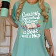 Somewhere Between a Book And a Nap – Cozy Reading Women's Comfort Colors T-Shirt Violet Somewhere Between a Book And a Nap – Cozy Reading Women's Comfort Colors T-Shirt Violet