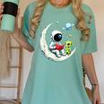 UFO Alien Astronaut Reading Book In Space Women's Comfort Colors T-Shirt Violet UFO Alien Astronaut Reading Book In Space Women's Comfort Colors T-Shirt Violet