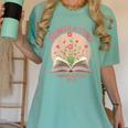 Women's Unearth a Story 2026 Summer Reading Program Flowers Book Women's Comfort Colors T-Shirt Violet Women's Unearth a Story 2026 Summer Reading Program Flowers Book Women's Comfort Colors T-Shirt Violet
