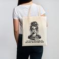 Book Lover Bent Over a Book Canvas Tote Bag