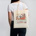 Book Lovers Winter Sleighing Through Stories Tee Premium Tri-Blend Canvas Tote Bag