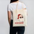He Knows What You'Ve Been Reading Book Lover Women Santa Canvas Tote Bag