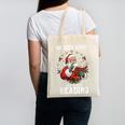He Sees What You'Ve Been Reading Santa Book Lover Canvas Tote Bag He Sees What You'Ve Been Reading Santa Book Lover Canvas Tote Bag