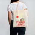 Staying Alive One Book At A Time Skeleton Reading Librarian Canvas Tote Bag