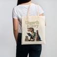 Unearth A Story Dinosaur Reading a Library Book Canvas Tote Bag