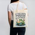 Unearth a Story Frog Reading a Book Summer 2026 Premium Tri-Blend Canvas Tote Bag Unearth a Story Frog Reading a Book Summer 2026 Premium Tri-Blend Canvas Tote Bag