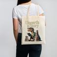 Women's Unearth A Story Dinosaur Reading a Library Book Canvas Tote Bag Women's Unearth A Story Dinosaur Reading a Library Book Canvas Tote Bag