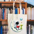 UFO Alien Astronaut Reading Book In Space Canvas Tote Bag