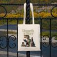 Unearth A Story Dinosaur Reading a Library Book Canvas Tote Bag