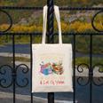 A Woman Cannot Survive On Books Alone She Needs Yarn Crochet Premium Tri-Blend Canvas Tote Bag A Woman Cannot Survive On Books Alone She Needs Yarn Crochet Premium Tri-Blend Canvas Tote Bag