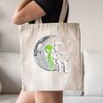 Astronaut Reading Book To Alien Moon Space Women Kids Men Premium Tri-Blend Canvas Tote Bag Astronaut Reading Book To Alien Moon Space Women Kids Men Premium Tri-Blend Canvas Tote Bag