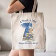 A Book A Day Keeps Reality Away Premium Tri-Blend Canvas Tote Bag