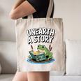 Unearth a Story Frog Reading a Book Summer 2026 Premium Tri-Blend Canvas Tote Bag Unearth a Story Frog Reading a Book Summer 2026 Premium Tri-Blend Canvas Tote Bag