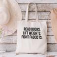 Read Books Lift Weights Fight Fascists Premium Tri-Blend Canvas Tote Bag Read Books Lift Weights Fight Fascists Premium Tri-Blend Canvas Tote Bag