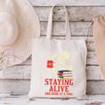 Staying Alive One Book At A Time Skeleton Reading Librarian Canvas Tote Bag