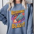 Book Lover Kids And Adults Reading Is a Blast Rocket Ship Comfort Colors Sweatshirt Denim Book Lover Kids And Adults Reading Is a Blast Rocket Ship Comfort Colors Sweatshirt Denim
