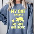 My Cat Guards My Mug And Book Humor Cats Premium Tri-Blend Comfort Colors Sweatshirt Denim