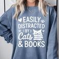 Easily Distracted By Cats And Books Reading Apparel Premium Tri-Blend Comfort Colors Sweatshirt Denim Easily Distracted By Cats And Books Reading Apparel Premium Tri-Blend Comfort Colors Sweatshirt Denim