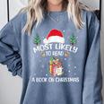 Most Likely To Read A Book On Christmas Love Reading Books Comfort Colors Sweatshirt Denim Most Likely To Read A Book On Christmas Love Reading Books Comfort Colors Sweatshirt Denim