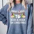 Most Likely To Read A Book On Christmas Snowman Family Comfort Colors Sweatshirt Denim