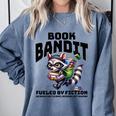 Racoon-Bookworm-Book Bandit-Fueled By Fiction Comfort Colors Sweatshirt Denim Racoon-Bookworm-Book Bandit-Fueled By Fiction Comfort Colors Sweatshirt Denim