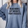 Read Books Lift Weights Fight Fascists Premium Tri-Blend Comfort Colors Sweatshirt Denim Read Books Lift Weights Fight Fascists Premium Tri-Blend Comfort Colors Sweatshirt Denim