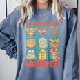 Women's DCC Many Faces Of Mordecai Grid Gamer Series Book Comfort Colors Sweatshirt Denim Women's DCC Many Faces Of Mordecai Grid Gamer Series Book Comfort Colors Sweatshirt Denim