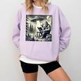 Bigfoot With Alien Reading A Book Bigfoot And UFO Comfort Colors Sweatshirt Crimson