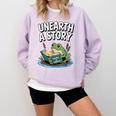Unearth a Story Frog Reading a Book Summer 2026 Comfort Colors Sweatshirt Crimson Unearth a Story Frog Reading a Book Summer 2026 Comfort Colors Sweatshirt Crimson
