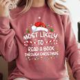 Most Likely To Read A Book Through Christmas Xmas Comfort Colors Sweatshirt Orchid