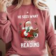 He Sees What You'Ve Been Reading Santa Book Lover Comfort Colors Sweatshirt Orchid He Sees What You'Ve Been Reading Santa Book Lover Comfort Colors Sweatshirt Orchid