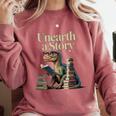Unearth A Story Dinosaur Reading a Library Book Comfort Colors Sweatshirt Orchid Unearth A Story Dinosaur Reading a Library Book Comfort Colors Sweatshirt Orchid