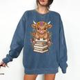 Cute Baby Highland Cow Reading Book Librarian Bookworm Comfort Colors Sweatshirt Blue Jean