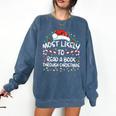 Most Likely To Read A Book Through Christmas Xmas Comfort Colors Sweatshirt Blue Jean