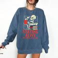 Staying Alive One Book At A Time Skeleton Reading Librarian Comfort Colors Sweatshirt Blue Jean