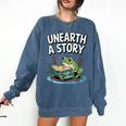 Unearth a Story Frog Reading a Book Summer 2026 Comfort Colors Sweatshirt Blue Jean Unearth a Story Frog Reading a Book Summer 2026 Comfort Colors Sweatshirt Blue Jean