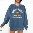 Women's Unearth a Story 2026 Summer Reading Program Tree Book Comfort Colors Sweatshirt Blue Jean Women's Unearth a Story 2026 Summer Reading Program Tree Book Comfort Colors Sweatshirt Blue Jean