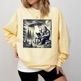 Bigfoot With Alien Reading A Book Bigfoot And UFO Comfort Colors Sweatshirt Blue Spruce