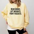 Read Books Lift Weights Fight Fascists Premium Tri-Blend Comfort Colors Sweatshirt Blue Spruce Read Books Lift Weights Fight Fascists Premium Tri-Blend Comfort Colors Sweatshirt Blue Spruce
