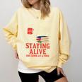 Staying Alive One Book At A Time Skeleton Reading Librarian Comfort Colors Sweatshirt Blue Spruce