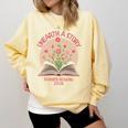 Unearth a Story 2026 Summer Reading Program Flowers Book Premium Tri-Blend Comfort Colors Sweatshirt Blue Spruce