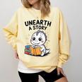Unearth a Story Cute Dinosaur Summer Reading 2026 Dino Book Comfort Colors Sweatshirt Blue Spruce Unearth a Story Cute Dinosaur Summer Reading 2026 Dino Book Comfort Colors Sweatshirt Blue Spruce