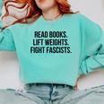Read Books Lift Weights Fight Fascists Premium Tri-Blend Comfort Colors Sweatshirt Butter Read Books Lift Weights Fight Fascists Premium Tri-Blend Comfort Colors Sweatshirt Butter