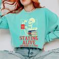 Staying Alive One Book At A Time Skeleton Reading Librarian Comfort Colors Sweatshirt Butter