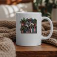 Cosy Sloth In Bookshelf With Plants Graphic Print Coffee Mug