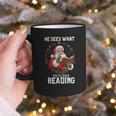 He Sees What You'Ve Been Reading Santa Book Lover Graphic Print Coffee Mug He Sees What You'Ve Been Reading Santa Book Lover Graphic Print Coffee Mug