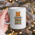 Cute Orange Tabby Cat Reading On Pile Of Books Graphic Print Coffee Mug