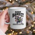 Racoon-Bookworm-Book Bandit-Fueled By Fiction Graphic Print Coffee Mug Racoon-Bookworm-Book Bandit-Fueled By Fiction Graphic Print Coffee Mug