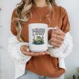 Unearth a Story Frog Reading a Book Summer 2026 Premium Tri-Blend Graphic Print Coffee Mug Unearth a Story Frog Reading a Book Summer 2026 Premium Tri-Blend Graphic Print Coffee Mug